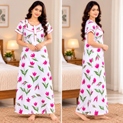 Yoga women's cotton floral printed nighty with front zip, white fabric with orange and green leaf patterns and contrast orange neckline.